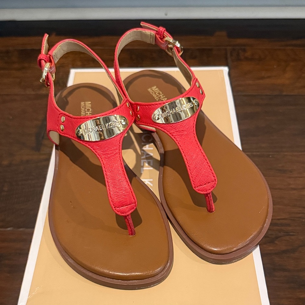 Michael Kors Red T-Strap Sandals with Gold Logo Plate